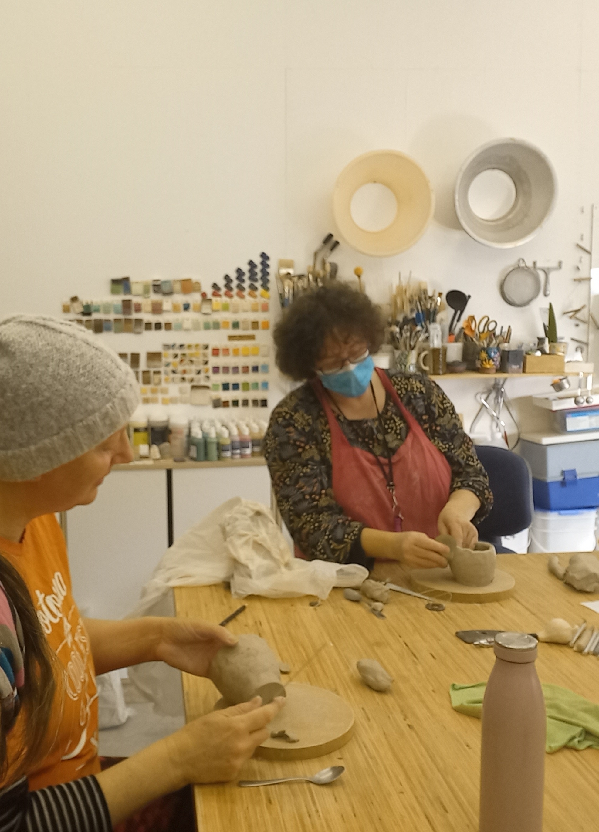 Sarah Ziessen leads a pottery workshop